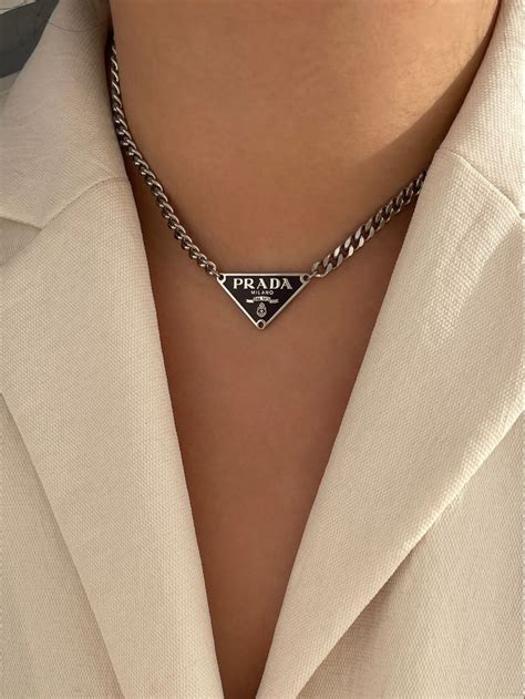 prada white and gold necklace|prada necklace for boys.